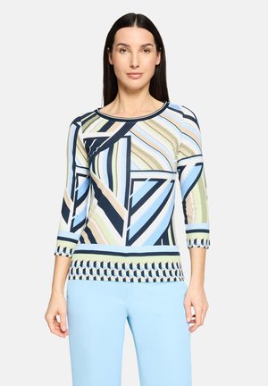Langärmliges Oberteil mit einem geometrischen Muster in Marineblau, Hellblau, Grün und Beige. Rundhalsausschnitt und strukturierter Saum mit wiederholendem Muster.