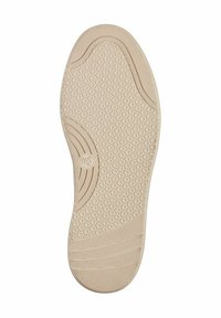 Beige színű cipőtalp, texturált, hatszögletű mintával és sima vonalakkal. Enyhén ívelt kialakítású, bal alsó sarkán logóval.