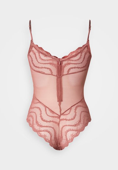 Mezgla ķermeņa tērps putekļainā rozā krāsā ar viļņotām malām, zigzagveida rakstu, regulējamām siksniņām un centrālu aizdari ar āķi aizmugurē.