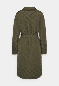Quilted olive green coat with a belted waist, long sleeves, and a collar, featuring a diamond pattern throughout the fabric.