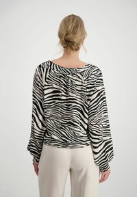 Monari GESMOKTE ZEBRAMUSTER  - Blouse - schwarz gemustert (998)