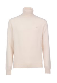 Kerman turtleneck villatakki pehmeästä kankaasta, jossa on pitkät hihat ja ribattua yksityiskohtaa kauluksessa ja helmassa. Huomaamaton logo rinnassa.