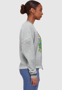 ABSOLUTE CULT TOY STORY - ALIEN HALLOWEEN TRICK OR TOYS OVERSIZE CREWNECK - Felpa - heather grey