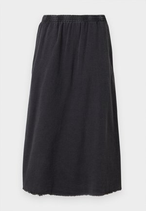 Fekete pamut szoknya, elasztikus derékkal, térdközépig érő, francia szegéllyel és egyszerű, egyenes vonalvezetéssel.