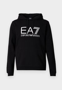 Fekete kapucnis pulóver elülső kenguruzsebbel. A mellrészen vastag fehér felirat: "EA7 EMPORIO ARMANI". Pamut keverék anyagból készült.