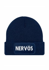 Navy knit beanie with a fold-over cuff and a rectangular patch displaying the word "NERVÖS" in white, contrasted against the dark background.