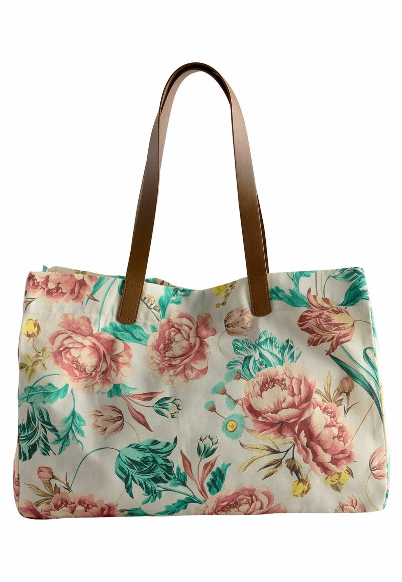 Bolsa de lona con un patrón floral en rosa y verde azulado, que cuenta con asas de cuero marrón y una forma rectangular estructurada.