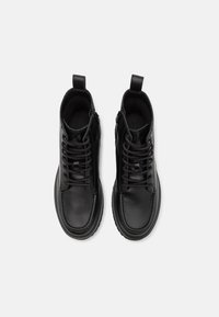 Calvin Klein Jeans EVA BOOT MID LACEUP - Nööritavad poolsaapad - triple black