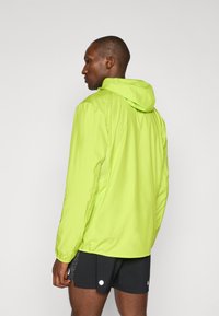 ASICS CORE zielony neon