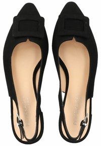 Black slingback heels with a pointed toe, soft fabric upper, side cutouts, and a prominent square buckle detail. Light-colored insole.