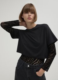 Calliope FLOCK FAN1 SC69 - Blouse - une variante