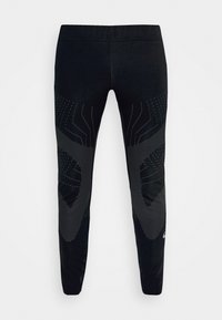 Leggings de sport noirs avec un design texturé et à motifs en gris foncé. Dotés d'une ceinture solide et de jambes fuselées avec des accents près des genoux.