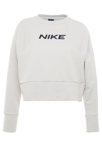 Sweat-shirt gris raccourci avec un col rond, des poignets côtelés et un logo noir "NIKE" sur la poitrine. Tissu doux et texturé.