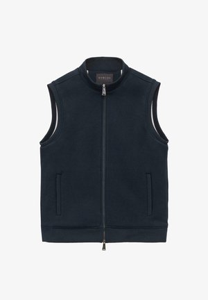 Granatowa bezrękawnik uszyty z miękkiego materiału, z wysokim kołnierzem, zamek błyskawiczny z przodu oraz bocznymi kieszeniami. Prosty, elegancki design.