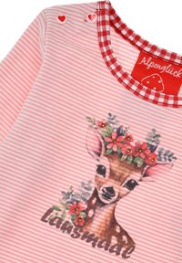 Striped pink fabric top with a deer graphic adorned with flowers, green leaves, and small accents. Gingham trimming and heart-shaped buttons.