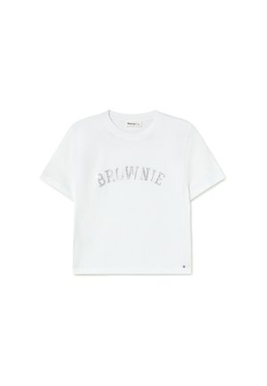 Camiseta blanca corta hecha de algodón. Presenta el texto de lentejuelas plateadas "BROWNIE" en el pecho. Mangas cortas y escote redondo.
