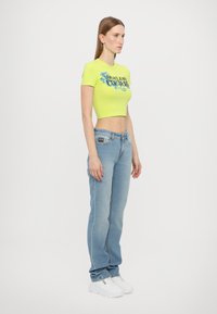 Versace Jeans Couture T-shirts med print - kiwi