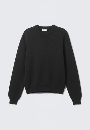 Black long-sleeve knit sweater with crew neck, ribbed cuffs, and hem, laid flat against a light background.