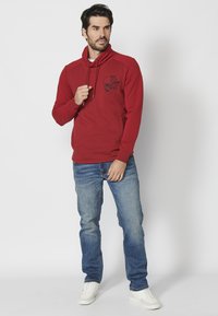 Koroshi Melegítőfelső - rojo red