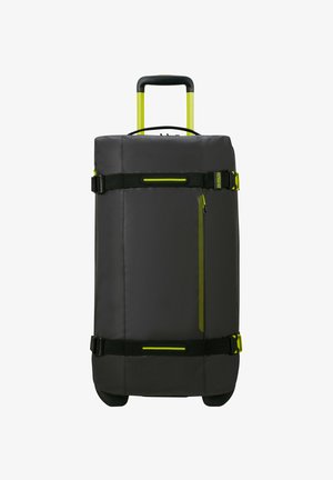 Schwarze Duffle-Tasche mit ausziehbarem Griff, gelben Akzenten und Nylonstoff. Verfügt über eine seitliche Reißverschlusstasche und verstellbare Träger.