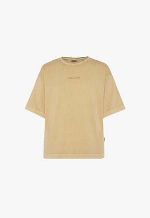 Beige oversized t-shirt made of cotton blend, with short sleeves and a crew neck. Features logo printed in a darker shade on the front.