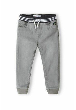 Pantaloni da jogger grigi con vita elastica a strisce nere e bianche, cordino e polsini a costine, dotati di tasche frontali e dettagli con toppa.
