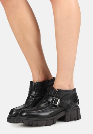 Bottines à plateau - black