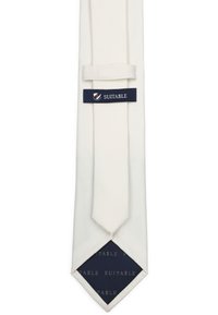 Witte strik met een gestructureerde stof, smal ontwerp, met een marineblauwe label waarop "SUITABLE" staat en een marineblauwe binnenvoering met patroon.