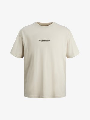 Light beige t-shirt made of cotton, featuring a crew neck, short sleeves, and a centered black printed logo that reads "Originals Studio."