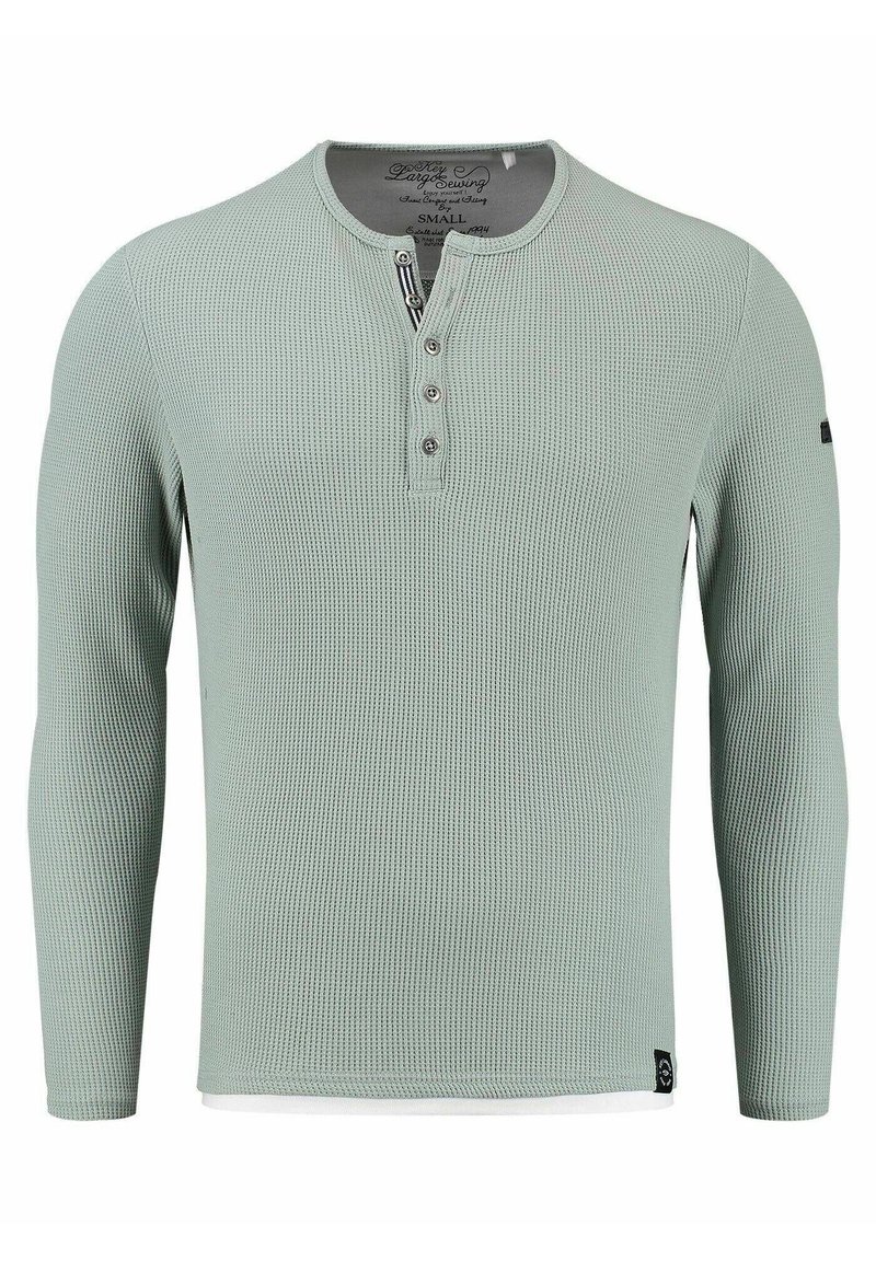 Hellgrünes Langarm-Henley-Shirt mit gerippter Textur, dreiknöpfiger Knopfleiste und schwarzem Akzent am Saum. Weicher Stoff. Größe S.