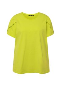 Limegrøn, kortærmet t-shirt lavet af bomuld med rund hals og puffede skuldre. Glat tekstur, afslappet pasform.