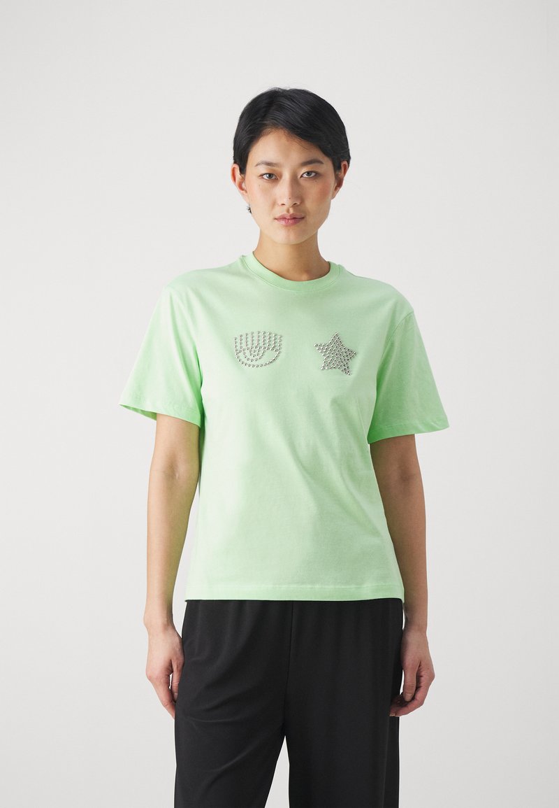 Light green cotton t-shirt featuring a crew neck, short sleeves, and rhinestone embellishments in the shape of a fan and star.