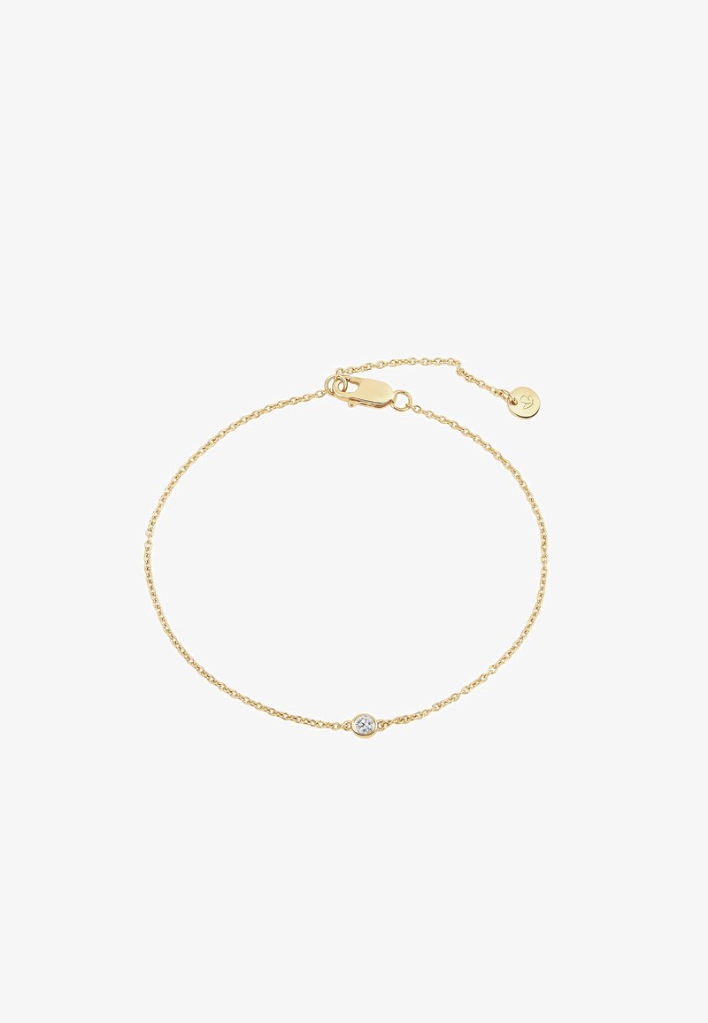 Bracelet chaîne en or avec un design délicat de maillons, comprenant une pierre claire unique sertie en chaton. Comprend un fermoir mousqueton et une chaîne d'extension.