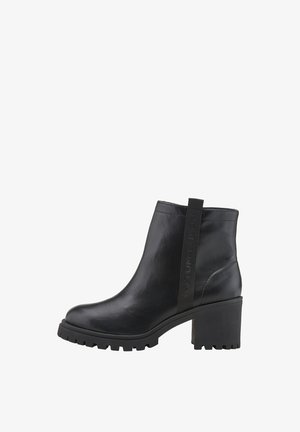 Black leather ankle boot with chunky heel, ridged sole, and branded pull tab on the side.