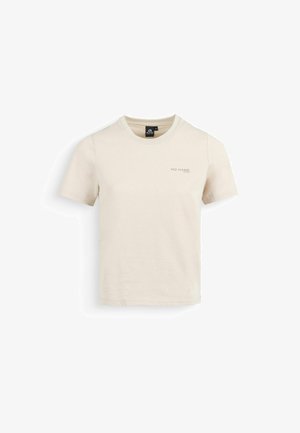 T-shirt beige à manches courtes avec col rond, petit logo "NO NAME" sur la poitrine gauche et étiquette noire au niveau du col.