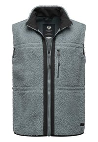 Fleece vest in light gray with a black collar and contrasting black zipper. Features zippered side pockets and textured fabric.
