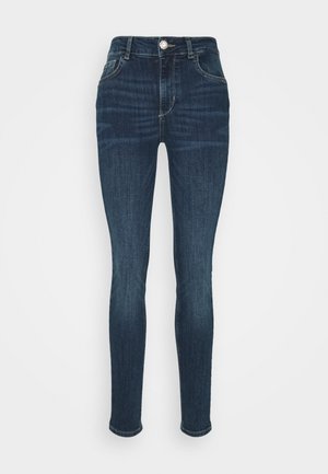 Donkerblauwe slim-fit jeans met knoop- en ritssluiting aan de voorkant, voor- en achterzakken en subtiel vervagen op dijen en knieën.