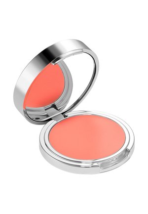 Kompakte runde silberne Schminkdose, geöffnet, zeigt korallfarbenen Creme-Rouge mit Spiegel im inneren Deckel.