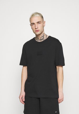 BADGE UNISEX - T-shirt - bas - black