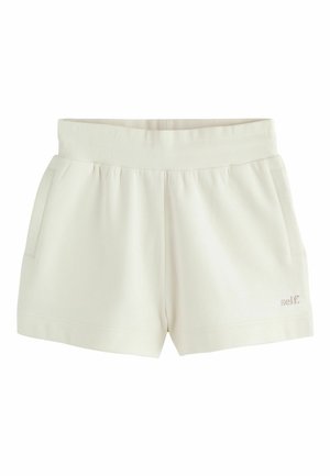 Casual shorts i cremefarve med ribbet elastisk linning, sidelommer og lille "self" broderi på venstre ben nederst.