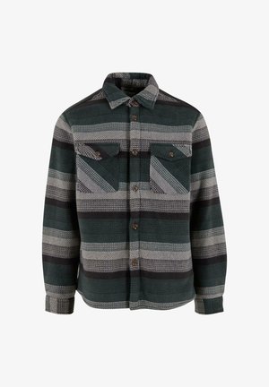 Sötétzöld, szürke és fekete csíkos flanel ing. Két mellzsebbe zárható gombbal, és hegyes gallérral rendelkezik. Puha tapintású.