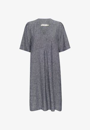 Pelēks, īsām piedurknēm tērps ar V veida kakla izgriezumu un brīvu piegriezumu. Izgatavots no teksturēta auduma ar minimālu šuvju skaitu un bez redzamā apdares elementiem.