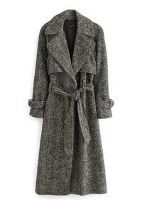 Grå og sort ternet trenchcoat. Fremstillet af et struktureret stof, med en bælte i taljen og en bred krave.