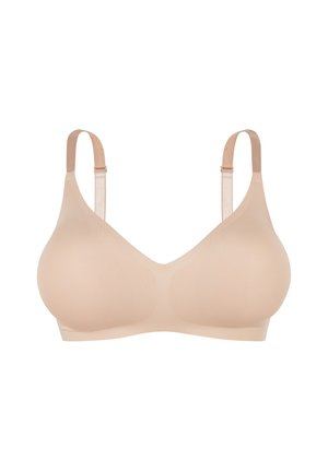 Soutien-gorge sans couture couleur peau, sans armatures, avec bretelles réglables, bonnets moulés et finition lisse pour un confort au quotidien.