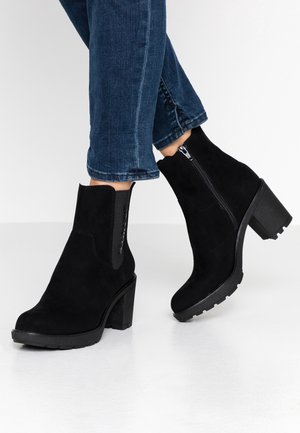 Botines con plataforma - black