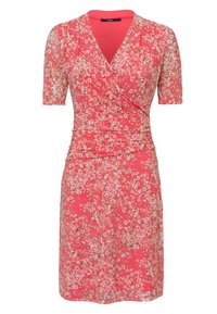 Kukallinen mekko korallinvärissä, jossa on lyhyet hihat, V-mallinen kaula-aukko ja rypytetty rakenne vyötäröllä. Pieniä valkoisia ja vaaleanpunaisia kukkia kauttaaltaan.