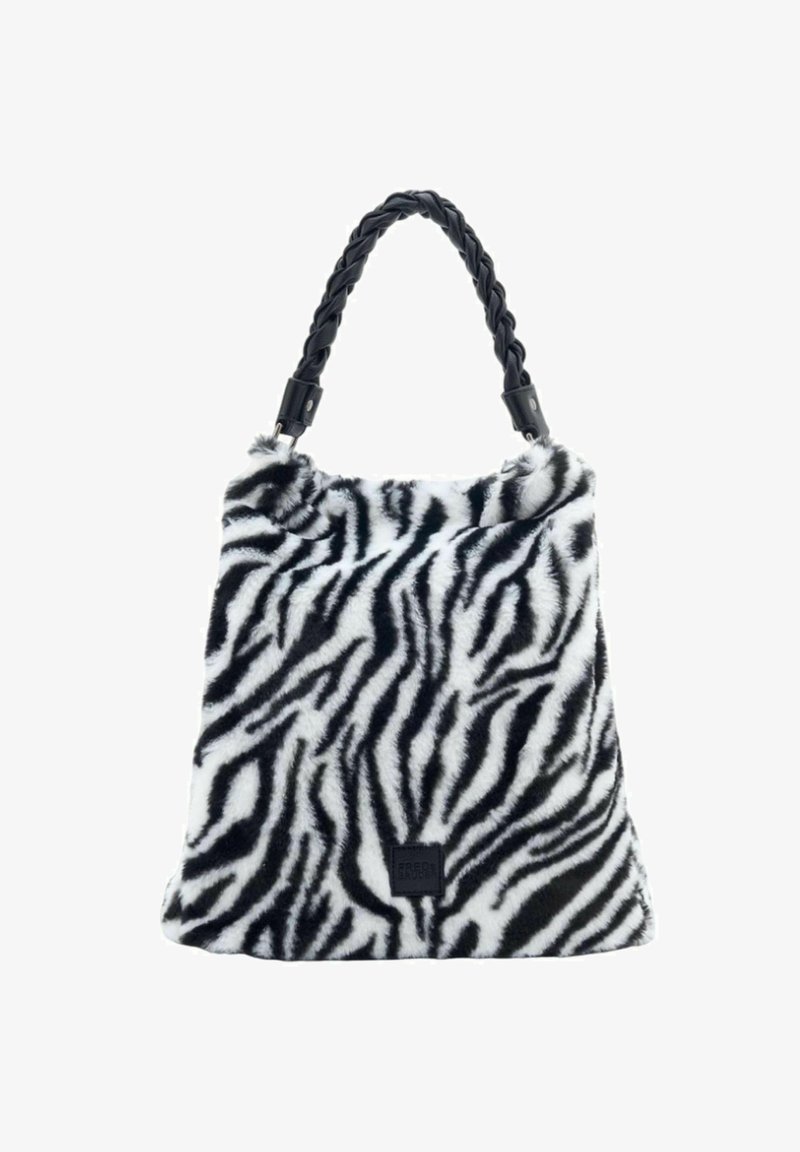 Zebra print faux fur handbag with a braided black handle and square logo accent at the bottom. Soft texture and striking black and white pattern.