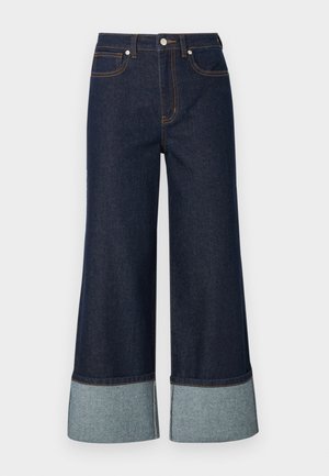 Weite Jeans aus dunklem Denim mit einem helleren Denimabschluss. Das Design umfasst Fronttaschen und kontrastierende Nähte.