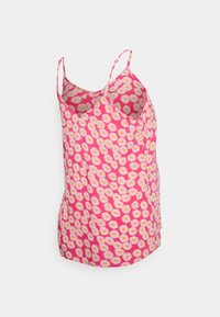 Camisola sem mangas rosa com um padrão floral de margaridas brancas; tecido leve com alças ajustáveis e um corte descontraído.