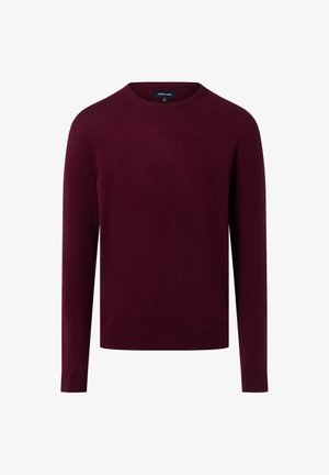 Pull à col rond bordeaux en maille douce. Il possède des manches longues et un ourlet droit avec une texture lisse et unie.